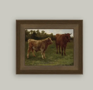 Two Cows Grazing Framed Print